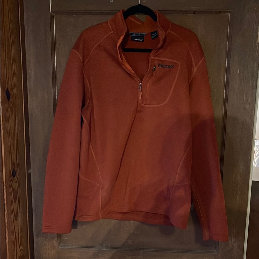 Marmot Orange Performance Jacket with High Collar and Soft Fleece Material